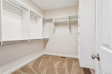 Nestled on a 1.2-acre cul-de-sac lot in Stonehouse, this 2817 sq on The Tradition Golf Club At Stonehouse in Virginia - for sale on GolfHomes.com, golf home, golf lot