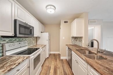 Welcome to Unit 903, a beautifully updated 1-bedroom, 1-bath on Hunters Green Country Club in Florida - for sale on GolfHomes.com, golf home, golf lot
