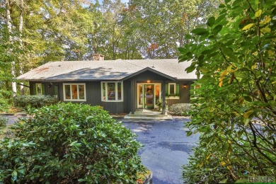 This home features 3 bedrooms and three full baths and all on on Highlands Country Club in North Carolina - for sale on GolfHomes.com, golf home, golf lot