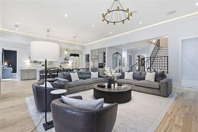 Situated within the prestigious Indian Hills Country Club on Indian Hills Country Club in Georgia - for sale on GolfHomes.com, golf home, golf lot