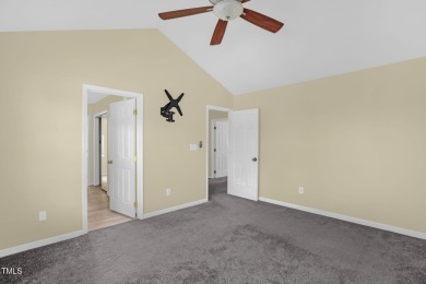 This beautifully updated home features a spacious living area on Hedingham Golf and Athletic Club in North Carolina - for sale on GolfHomes.com, golf home, golf lot