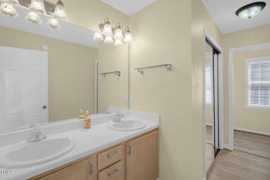 This beautifully updated home features a spacious living area on Hedingham Golf and Athletic Club in North Carolina - for sale on GolfHomes.com, golf home, golf lot