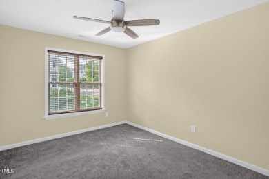 This beautifully updated home features a spacious living area on Hedingham Golf and Athletic Club in North Carolina - for sale on GolfHomes.com, golf home, golf lot