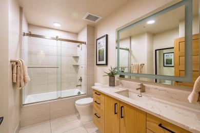 Discover luxury living in this exquisite 2-bedroom, 2-bathroom on Osprey Meadows at Tamarack Resort in Idaho - for sale on GolfHomes.com, golf home, golf lot