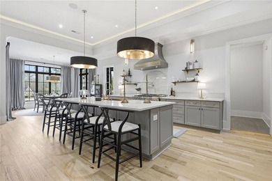 Situated within the prestigious Indian Hills Country Club on Indian Hills Country Club in Georgia - for sale on GolfHomes.com, golf home, golf lot