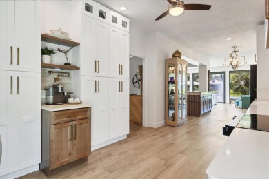 Welcome to an exquisitely revitalized estate set amidst a on The Oaks Club in Florida - for sale on GolfHomes.com, golf home, golf lot