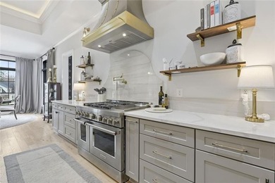 Situated within the prestigious Indian Hills Country Club on Indian Hills Country Club in Georgia - for sale on GolfHomes.com, golf home, golf lot