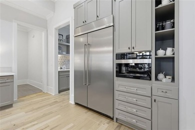 Situated within the prestigious Indian Hills Country Club on Indian Hills Country Club in Georgia - for sale on GolfHomes.com, golf home, golf lot