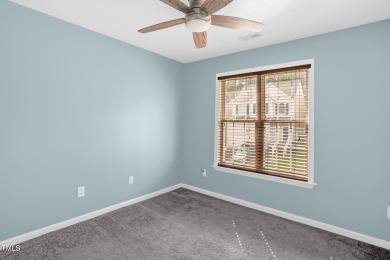 This beautifully updated home features a spacious living area on Hedingham Golf and Athletic Club in North Carolina - for sale on GolfHomes.com, golf home, golf lot
