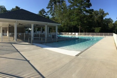 Nestled within the serene, gated golf community of Stoney Point on The Links At Stoney Point in South Carolina - for sale on GolfHomes.com, golf home, golf lot