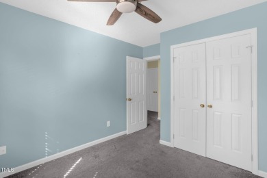 This beautifully updated home features a spacious living area on Hedingham Golf and Athletic Club in North Carolina - for sale on GolfHomes.com, golf home, golf lot