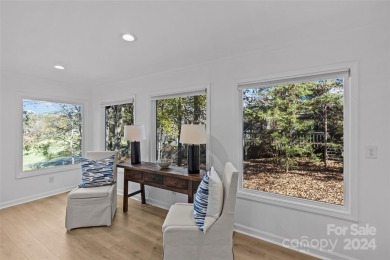 Absolutely stunning modern treehouse renovation in Raintree on Raintree Country Club in North Carolina - for sale on GolfHomes.com, golf home, golf lot