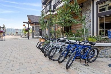 Discover luxury living in this exquisite 2-bedroom, 2-bathroom on Osprey Meadows at Tamarack Resort in Idaho - for sale on GolfHomes.com, golf home, golf lot