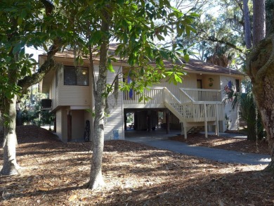 Desirable Duplex Style villa overlooking a scenic pond in gated on The Plantation Course At Edisto in South Carolina - for sale on GolfHomes.com, golf home, golf lot