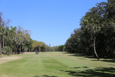 Desirable Duplex Style villa overlooking a scenic pond in gated on The Plantation Course At Edisto in South Carolina - for sale on GolfHomes.com, golf home, golf lot