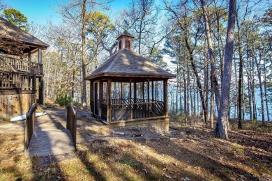 Welcome to your dream retreat--a stunning lakefront home in the on Tannenbaum Golf Club in Arkansas - for sale on GolfHomes.com, golf home, golf lot