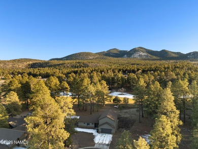 This spectacular 2,841 square foot home features four bedrooms on Highland Meadows Golf Club in Arizona - for sale on GolfHomes.com, golf home, golf lot