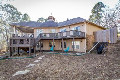 Welcome to your dream retreat--a stunning lakefront home in the on Tannenbaum Golf Club in Arkansas - for sale on GolfHomes.com, golf home, golf lot