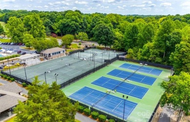 Absolutely stunning modern treehouse renovation in Raintree on Raintree Country Club in North Carolina - for sale on GolfHomes.com, golf home, golf lot