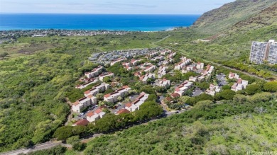 Discover the perfect blend of comfort and tranquility in this on Makaha Valley Country Club in Hawaii - for sale on GolfHomes.com, golf home, golf lot