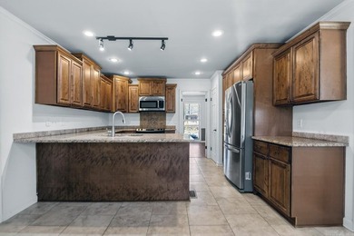 Tucked at the end of a quiet cul de sac on nearly half an acre on Maumelle Golf and Country Club in Arkansas - for sale on GolfHomes.com, golf home, golf lot