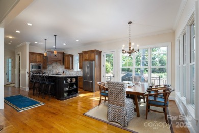 Experience lakefront living at its finest in this stunning on Old North State Club at Uwharrie Point Golf community in North Carolina - for sale on GolfHomes.com, golf home, golf lot