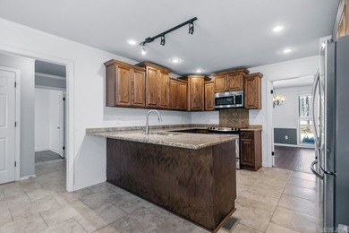 Tucked at the end of a quiet cul de sac on nearly half an acre on Maumelle Golf and Country Club in Arkansas - for sale on GolfHomes.com, golf home, golf lot