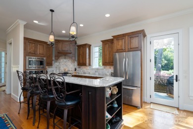 Experience lakefront living at its finest in this stunning on Old North State Club at Uwharrie Point Golf community in North Carolina - for sale on GolfHomes.com, golf home, golf lot