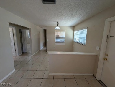 Quadruple your income with this fully rented WATERFRONT QUADPLEX on Rotonda Golf and Country Club The Hills Course in Florida - for sale on GolfHomes.com, golf home, golf lot