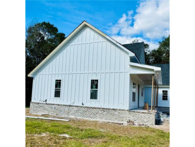 NEW CONSTRUCTED HOME BY COASTAL HAVEN HOMES AND PROPERTIES, SET on Sapelo Hammock Golf Club in Georgia - for sale on GolfHomes.com, golf home, golf lot