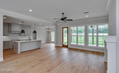 Welcome to 124 Grayson Way -- a beautifully built new on Lake Caroline Golf Club in Mississippi - for sale on GolfHomes.com, golf home, golf lot