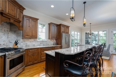 Experience lakefront living at its finest in this stunning on Old North State Club at Uwharrie Point Golf community in North Carolina - for sale on GolfHomes.com, golf home, golf lot