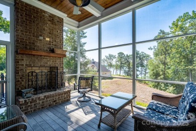 Experience lakefront living at its finest in this stunning on Old North State Club at Uwharrie Point Golf community in North Carolina - for sale on GolfHomes.com, golf home, golf lot