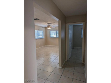 Quadruple your income with this fully rented WATERFRONT QUADPLEX on Rotonda Golf and Country Club The Hills Course in Florida - for sale on GolfHomes.com, golf home, golf lot