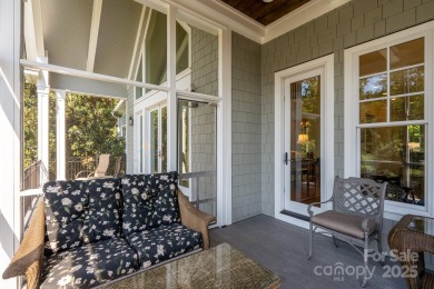 Experience lakefront living at its finest in this stunning on Old North State Club at Uwharrie Point Golf community in North Carolina - for sale on GolfHomes.com, golf home, golf lot
