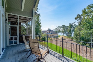 Experience lakefront living at its finest in this stunning on Old North State Club at Uwharrie Point Golf community in North Carolina - for sale on GolfHomes.com, golf home, golf lot