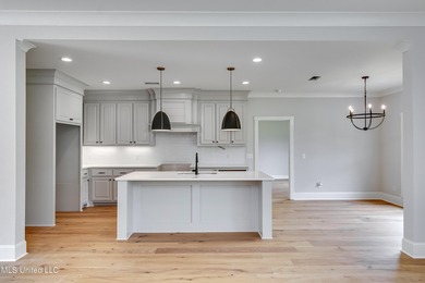 Welcome to 124 Grayson Way -- a beautifully built new on Lake Caroline Golf Club in Mississippi - for sale on GolfHomes.com, golf home, golf lot