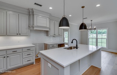 Welcome to 124 Grayson Way -- a beautifully built new on Lake Caroline Golf Club in Mississippi - for sale on GolfHomes.com, golf home, golf lot