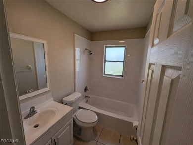 Quadruple your income with this fully rented WATERFRONT QUADPLEX on Rotonda Golf and Country Club The Hills Course in Florida - for sale on GolfHomes.com, golf home, golf lot