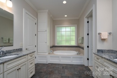 Experience lakefront living at its finest in this stunning on Old North State Club at Uwharrie Point Golf community in North Carolina - for sale on GolfHomes.com, golf home, golf lot