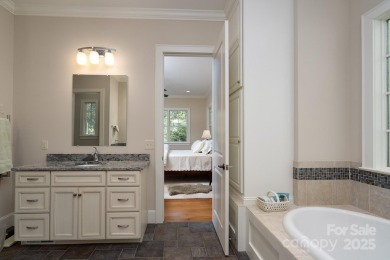 Experience lakefront living at its finest in this stunning on Old North State Club at Uwharrie Point Golf community in North Carolina - for sale on GolfHomes.com, golf home, golf lot
