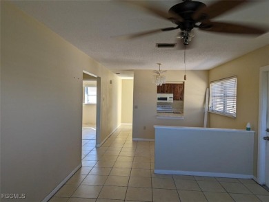 Quadruple your income with this fully rented WATERFRONT QUADPLEX on Rotonda Golf and Country Club The Hills Course in Florida - for sale on GolfHomes.com, golf home, golf lot