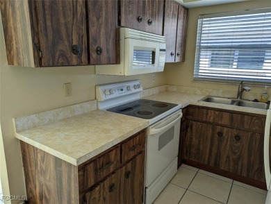 Quadruple your income with this fully rented WATERFRONT QUADPLEX on Rotonda Golf and Country Club The Hills Course in Florida - for sale on GolfHomes.com, golf home, golf lot