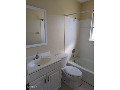 Quadruple your income with this fully rented WATERFRONT QUADPLEX on Rotonda Golf and Country Club The Hills Course in Florida - for sale on GolfHomes.com, golf home, golf lot