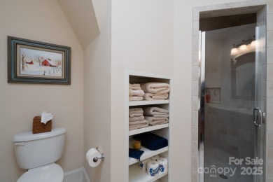 Experience lakefront living at its finest in this stunning on Old North State Club at Uwharrie Point Golf community in North Carolina - for sale on GolfHomes.com, golf home, golf lot