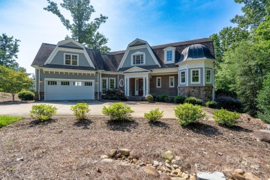 Experience lakefront living at its finest in this stunning on Old North State Club at Uwharrie Point Golf community in North Carolina - for sale on GolfHomes.com, golf home, golf lot
