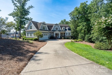 Experience lakefront living at its finest in this stunning on Old North State Club at Uwharrie Point Golf community in North Carolina - for sale on GolfHomes.com, golf home, golf lot