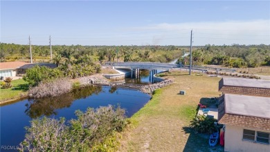 Quadruple your income with this fully rented WATERFRONT QUADPLEX on Rotonda Golf and Country Club The Hills Course in Florida - for sale on GolfHomes.com, golf home, golf lot