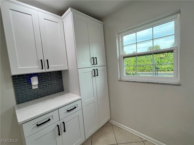 **WOW! A CORNER LOT*DBL GARAGE* AND AN EXTRA 2 SPACE PARKING on Cypress Lake Country Club in Florida - for sale on GolfHomes.com, golf home, golf lot