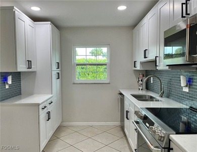 **WOW! A CORNER LOT*DBL GARAGE* AND AN EXTRA 2 SPACE PARKING on Cypress Lake Country Club in Florida - for sale on GolfHomes.com, golf home, golf lot